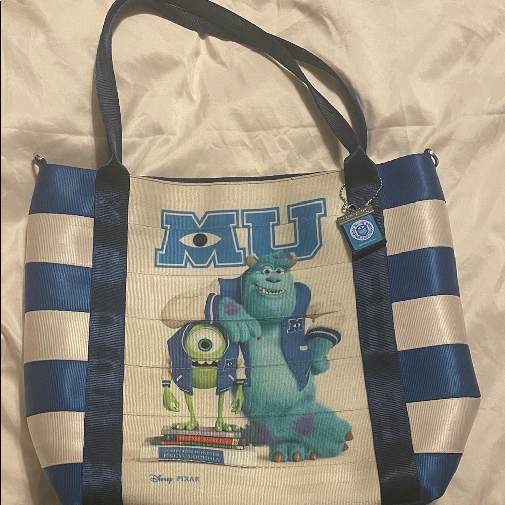 DISNEY MONSTERS UNIVERSITY POSTER TOTE Harvey’s Seatbelt bag PURSE monsters Inc.